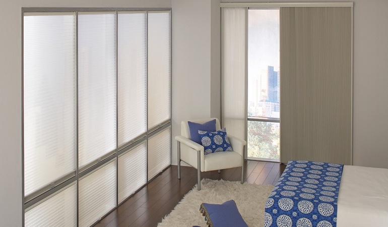 Cellular shades are another choice to support a minimalist design. Cellular shades in a minimalistic apartment.