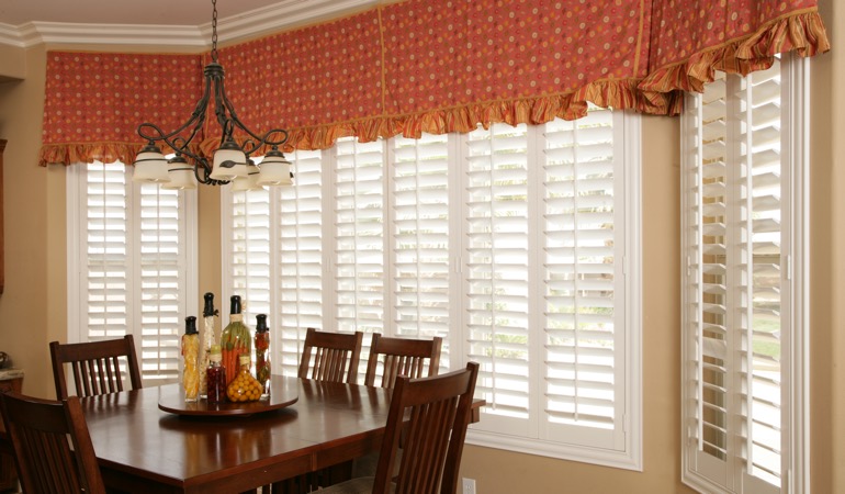 Decorative accents, drapes, and curtains may not provide the simplistic style you want. White shutters in Philadelphia dining room.
