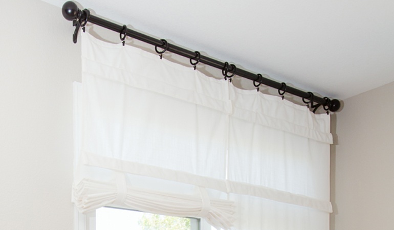 Tumble shades in Philadelphia give your doors privacy versatility and style. White tumble shade on double glass doors